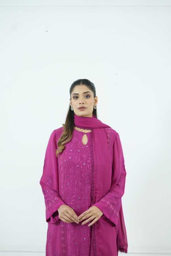 Magenta embroidered chiffon tunic with dupatta and lace pants.