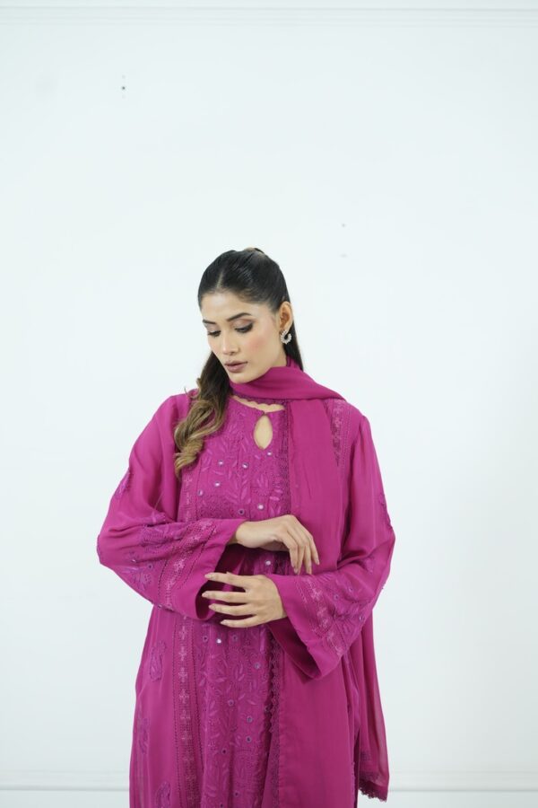 Magenta embroidered chiffon tunic with dupatta and lace pants.
