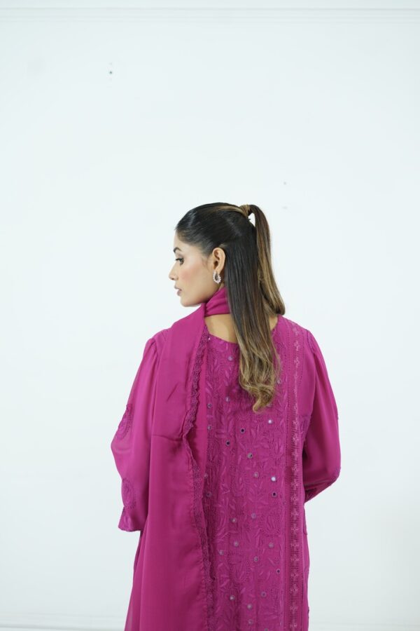 Magenta embroidered chiffon tunic with dupatta and lace pants.