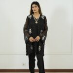 Eid new collection, best black collection,Black embroidered chiffon tunic with sheer sleeves, pearl embellishments, paired with matching straight pants and stylish sandals,Elegant and festive wear