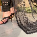 Eid new collection, best black collection,Black embroidered chiffon tunic with sheer sleeves, pearl embellishments, paired with matching straight pants and stylish sandals,Elegant and festive wear, chiffon duppata,