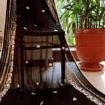Eid new collection, best black collection,Black embroidered chiffon tunic with sheer sleeves, pearl embellishments, paired with matching straight pants and stylish sandals,Elegant and festive wear, chiffon duppata,