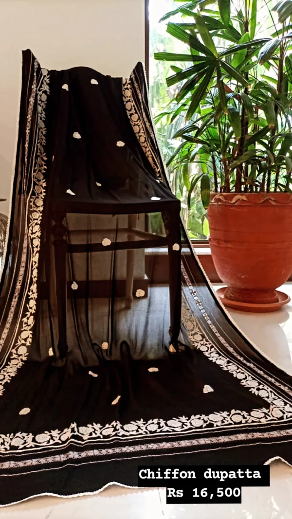 Eid new collection, best black collection,Black embroidered chiffon tunic with sheer sleeves, pearl embellishments, paired with matching straight pants and stylish sandals,Elegant and festive wear, chiffon duppata,